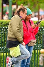 ZOE SALDANA Out in Disneyland 04/02/2022