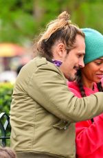 ZOE SALDANA Out in Disneyland 04/02/2022