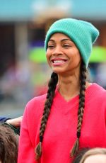 ZOE SALDANA Out in Disneyland 04/02/2022
