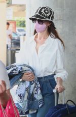 ANNE HATHAWAY and Adam Shulman Arrives in New York 05/21/2022