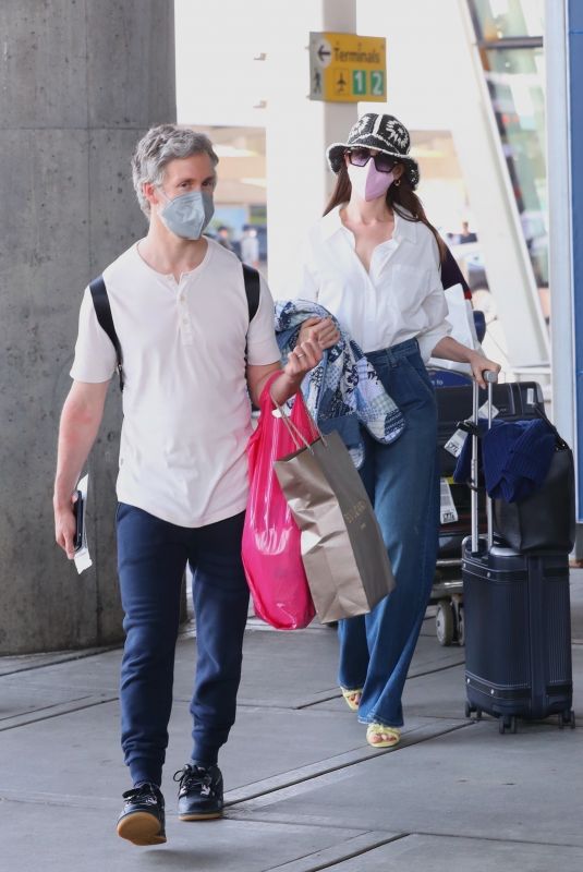 ANNE HATHAWAY and Adam Shulman Arrives in New York 05/21/2022