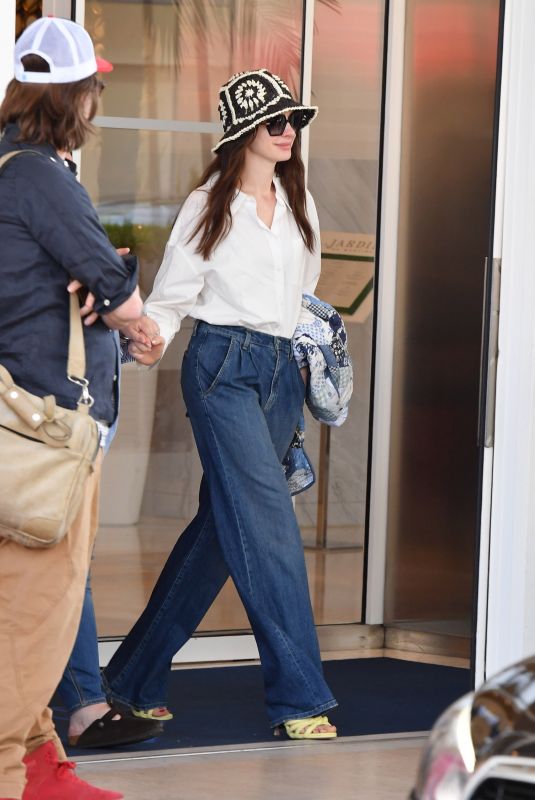 ANNE HATHAWAY Leaves 75th Annual Cannes Film Festival 05/21/2022
