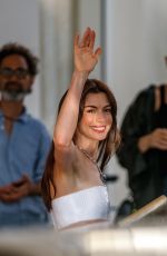 ANNE HATHAWAY Leaves Martinez Hotel at 75th Cannes Film Festival 05/19/2022