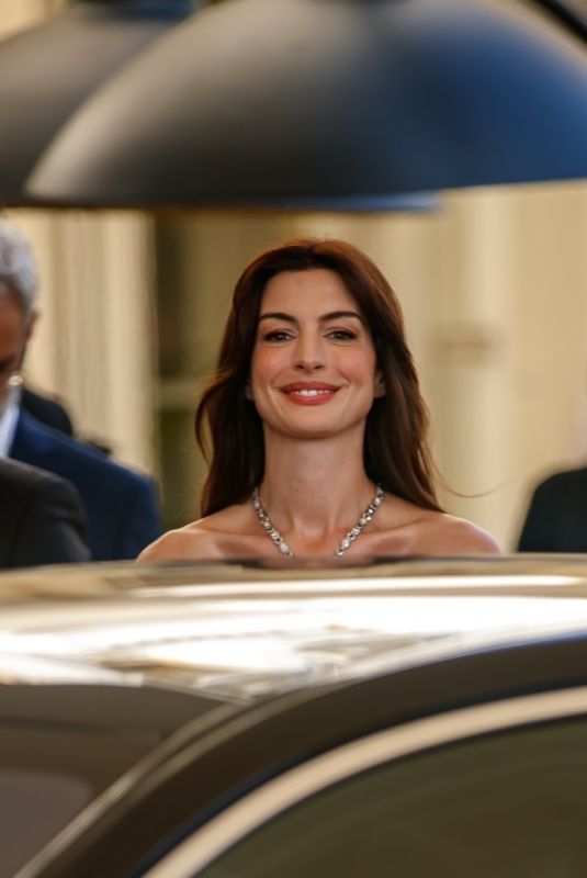 ANNE HATHAWAY Leaves Martinez Hotel at 75th Cannes Film Festival 05/19/2022