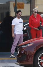 BRIGITTE NIELSEN and Mattia Dessi Out for Lunch in Los Angeles 05/26/2022