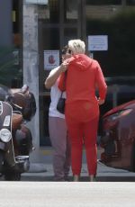 BRIGITTE NIELSEN and Mattia Dessi Out for Lunch in Los Angeles 05/26/2022