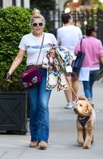 BUSY PHILIPPS Out Walking Her Dog in New York 04/30/2022