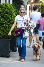 BUSY PHILIPPS Out Walking Her Dog in New York 04/30/2022