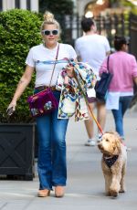 BUSY PHILIPPS Out Walking Her Dog in New York 04/30/2022