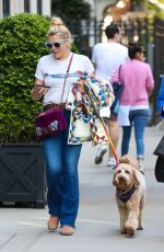 BUSY PHILIPPS Out Walking Her Dog in New York 04/30/2022