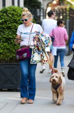 BUSY PHILIPPS Out Walking Her Dog in New York 04/30/2022