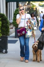 BUSY PHILIPPS Out Walking Her Dog in New York 04/30/2022