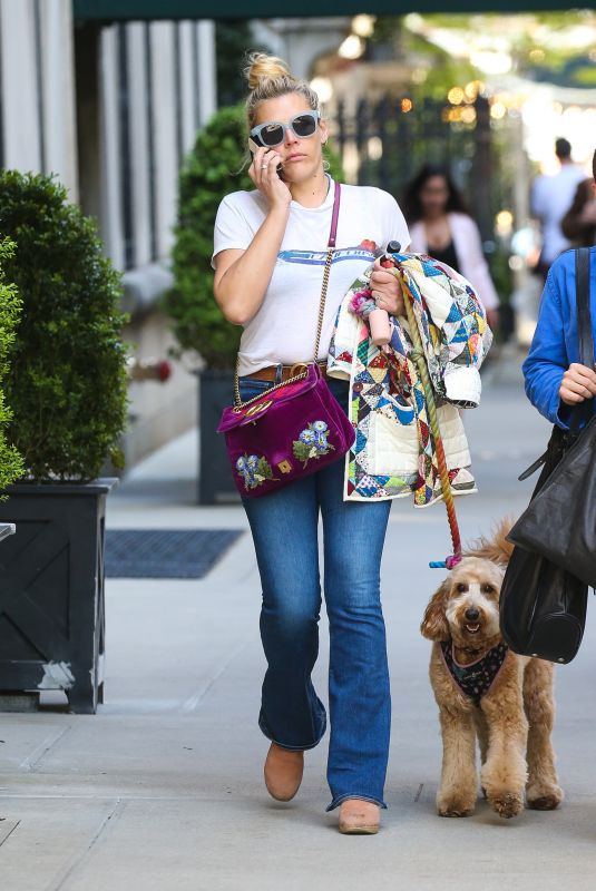 BUSY PHILIPPS Out Walking Her Dog in New York 04/30/2022