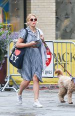 BUSY PHILIPPS Out with Her Dog in New York 05/29/2022