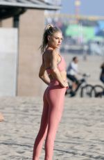 CHARLOTTE MCKINNEY at a Bikini Photoshoot in Los Angeles 05/05/2022