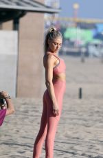 CHARLOTTE MCKINNEY at a Bikini Photoshoot in Los Angeles 05/05/2022