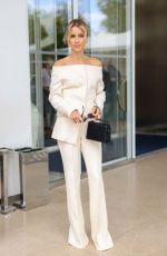 CLAIRE HOLT Leaves Martinez Hotel in Cannes 05/25/2022