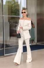CLAIRE HOLT Leaves Martinez Hotel in Cannes 05/25/2022