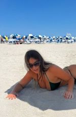 CLAUDIA ROMANI in Bikini at a Beach in Miami 05/15/2022
