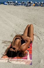 CLAUDIA ROMANI in Bikini at Loews Hotel in Miami Beach 05/01/2022