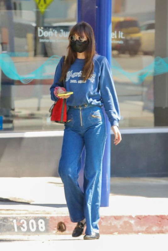 DAKOTA JOHNSON in Flared Denim at Sugaring LA Hair Removal in Santa Monica 05/10/2022