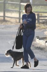 DAKOTA JOHNSON Out with Her Dog in Malibu 05/29/2022
