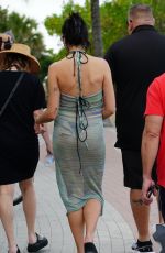 DUA LIPA in Bikini under a Sheer Cover-up at a Beach in Miami 05/02/2022