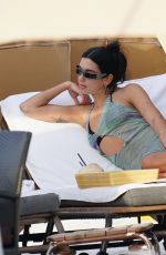 DUA LIPA in Bikini under a Sheer Cover-up at a Beach in Miami 05/02/2022