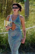 DUA LIPA in Bikini under a Sheer Cover-up at a Beach in Miami 05/02/2022