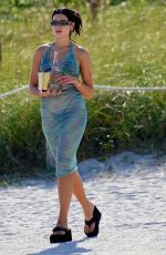 DUA LIPA in Bikini under a Sheer Cover-up at a Beach in Miami 05/02/2022