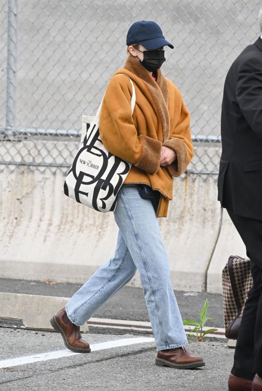 ELIZABETH OLSEN Arrives at JFK Airport in New York 05/03/2022
