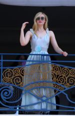ELLE FANNING at Balcony of Hotel Martinez at Cannes Film Festival 05/19/2022