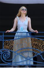 ELLE FANNING at Balcony of Hotel Martinez at Cannes Film Festival 05/19/2022