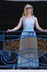 ELLE FANNING at Balcony of Hotel Martinez at Cannes Film Festival 05/19/2022