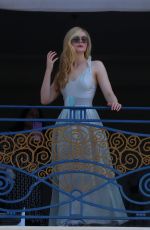 ELLE FANNING at Balcony of Hotel Martinez at Cannes Film Festival 05/19/2022
