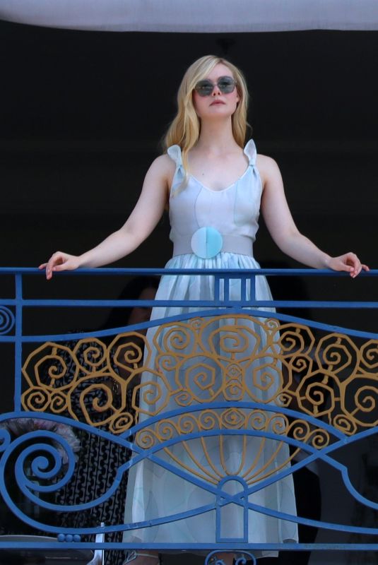 ELLE FANNING at Balcony of Hotel Martinez at Cannes Film Festival 05/19/2022