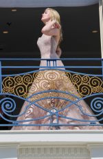 ELLE FANNING at Hotel Martinez Balcony at 2022 Cannes Film Festival 05/17/2022