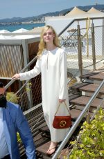 ELLE FANNING Leaves Hotel Martinez in Cannes 05/19/2022