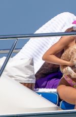 HAILEY BIEBER in Bikini at a Boat in Cabo San Lucas 05/25/2022