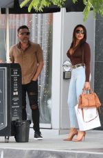 HOLLY SONDERS and Oscar De La Hoya Out in Beverly Hills 05/27/2022