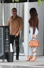 HOLLY SONDERS and Oscar De La Hoya Out in Beverly Hills 05/27/2022