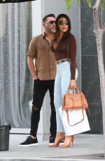 HOLLY SONDERS and Oscar De La Hoya Out in Beverly Hills 05/27/2022