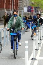 KATIE HOLMES and Bobby Wooten Out Riding Bikes in New York 05/08/2022