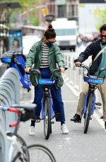 KATIE HOLMES and Bobby Wooten Out Riding Bikes in New York 05/08/2022