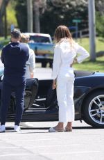 KELLY BENSIMON Checks Out a Porsche on Her 54th Birthday in New York 05/01/2022