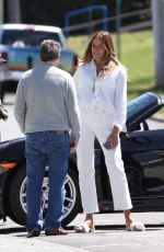 KELLY BENSIMON Checks Out a Porsche on Her 54th Birthday in New York 05/01/2022
