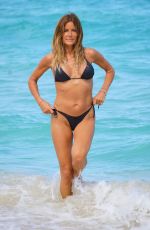 KELLY BENSIMON in Bikini at a Beach in Miami 05/13/2022