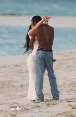 KYLIE JENNER and Travis Scott in Romantic Sunset in Turks and Caicos 05/03/2022