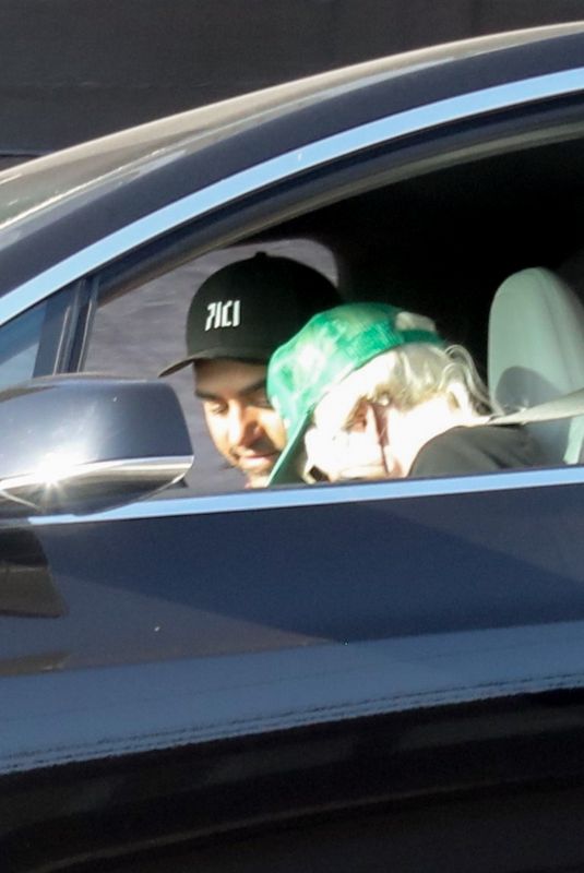 LADY GAGA and boyfriend Michael Polansky Out Driving in Malibu 05/10/2022
