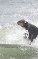 LEIGHTON MEESTER and Adam Brody at a Surfing Session in Malibu 05/10/2022